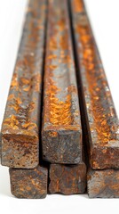 Close-up of deformed steel bars with rust spots, isolated on white, highlighting their weathered texture and industrial feel, ideal for construction imagery