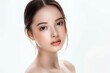 © QuietWord - close up face portrait of young pretty Asian woman brown eyes with bright flawless clean clear skin, beauty cosmetic or skincare fashion portrait with copy space