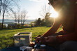 © Berena Alvarez/Stocksy - man on picnic at sunset in oslo