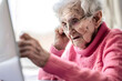 © RemsH - an elderly person with a laptop, technology and seniors, scam, isolation, vulnerable