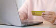 © mangpor2004 - Close up of woman hand make payment online shopping by credit card via laptop computer