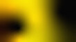 © Your Background - Abstract gradient background blending from yellow to black with noise grain texture