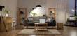 © Pixel-Shot - Interior of living room with comfortable sofa, table, racks and glowing lamps in evening