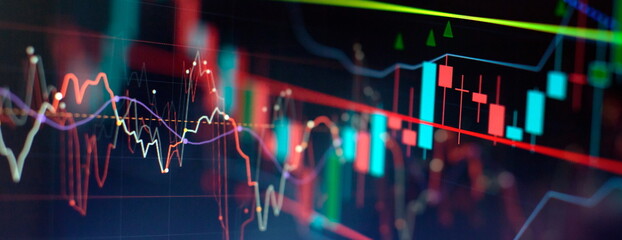 Technical price graph and indicator, red and green candlestick chart on blue theme screen, market volatility, up and down trend. Stock trading, crypto currency background.