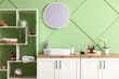 © Pixel-Shot - Chest of drawers with sink and bath supplies in stylish interior of bathroom