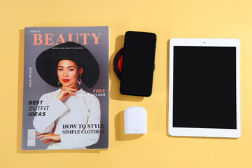 Wall Mural - set of modern gadgets and magazine on color background