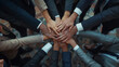 © suldev - Business people putting their hands together, top view