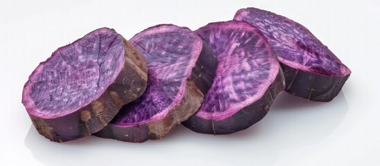 Wall Mural - Freshly Sliced Purple Sweet Potatoes