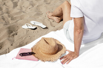 Sticker - Png beach towel mockup with senior woman summer fashion shoot