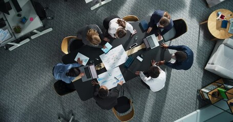 Aufkleber - Top Down View Of Diverse Team Of Business Specialists And Managers With Laptops Entering The Conference Room And Sitting Behind Table To Discuss Financial Data And Sales Reports In Corporate Office.