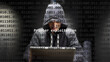 © maurice norbert - Cyber attack printer exploitation text in foreground screen, anonymous hacker hidden with hoodie in the blurred background. Vulnerability text in binary system code on editor program.