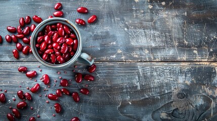 Wall Mural - Red beans cup on gray wooden surface with blank space