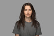 © kazantsevaov - Portrait of a young woman in a white T-shirt. No make up, neutral