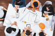 © Summit Art Creations - Top view banner of diverse group of civil engineer and client working together on architectural project, reviewing construction plan and building blueprint at meeting table. Prudent