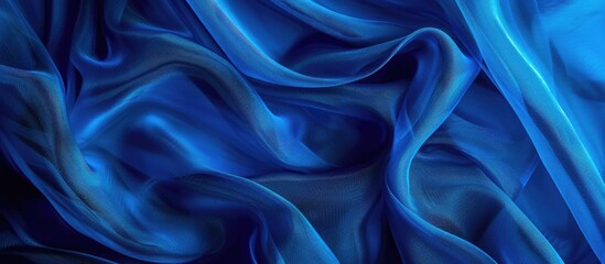 Fototapete - Background with a blue fabric texture providing copy space image.