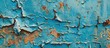 © meristock - Abstract background featuring the texture of an old rusty metal sheet with peeling blue paint, providing copy space image.