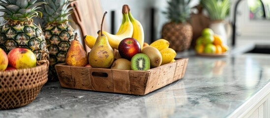 Aufkleber - Assorted fruits like apples, pears, bananas, kiwis, mango, and pineapple in wooden baskets on a kitchen quartz worktop, with copy space image.
