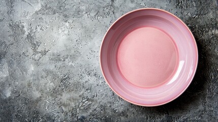 Canvas Print - Empty pink plate on concrete surface Room for design