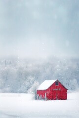 Wall Mural - A red barn standing in a snowy field, with a soft background of snow-covered trees and landscape. 