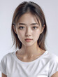 © Gumby - Asian Japanese girl beautiful eyes in white t-shirt with healthy skin super realistic white studio background.