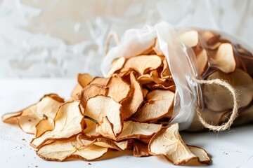 Poster - Dehydrated pear chips in a pack on light background