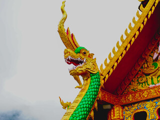 Beautiful sculptures at Sapan Temple in the middle of a valley surrounded by nature in Nan Province, Thailand.