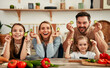 © Valerii Apetroaiei - Happy Family Engaging in Fun and Healthy Cooking Activity with Vegetables in the Kitchen