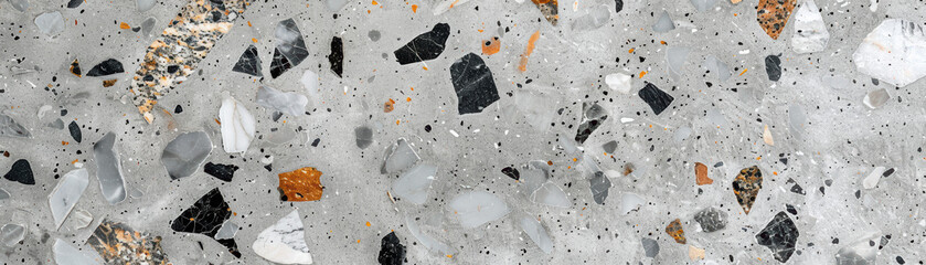 Poster - Polished terrazzo surface with a mosaic of colorful stone and marble fragments embedded in concrete, showcasing a unique texture and pattern.