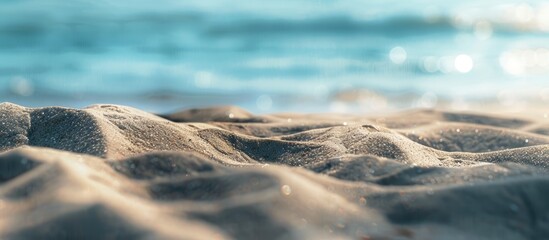 Poster - Sand with a serene beach background providing ample copy space image.