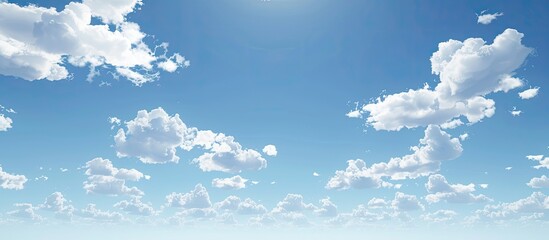 Poster - The expansive sky with fluffy, white clouds provides a serene backdrop in the copy space image.