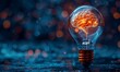 © SH Design - 3D rendering of a light bulb with a brain inside on a dark blue background.