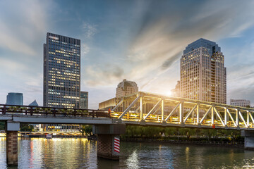 Wall Mural - Urban Skyline and Bridge at Sunset