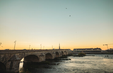 Wall Mural - A stone bridge at sunset in vannes, france