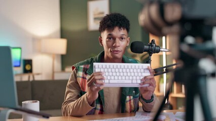 Poster - Camera, influencer and man with promotion, product and keyboard in living room with mic for advertising. Home, feedback and content creation for blogger for gaming equipment, online and lounge