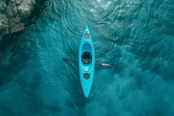 Poster - Aerial view of blue kayak floating in crystal clear water