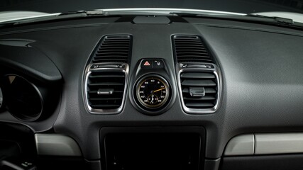 Canvas Print - Dashboard clock in a car