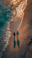 Canvas Print - A couple is walking on the beach