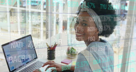 Aufkleber - Image of trading board over biracial woman analyzing infographic interface on laptop