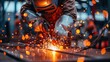 © Suphot - Welder in a workshop using a welding torch, creating many sparks. The image captures industrial work and craftsmanship in action.