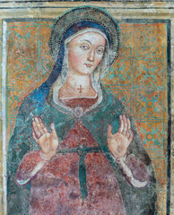 PERUGIA, ITALY - MAY 17, 2024: The medieval fresco of Virgin Mary in the church Chiesa di San Michele Arcangelo by unknown artist.