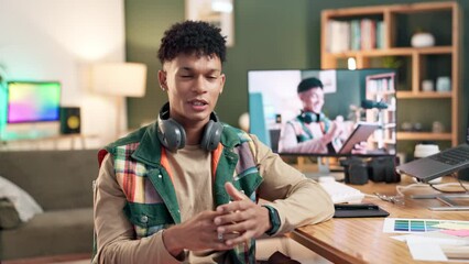 Poster - Influencer, talking and review with computer screen for podcast or content creator, discussion with mockup. Man, home office and face communication, internet broadcast with information and promotion