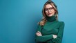 ©  Designer Kim - Photo Of A Pretty Blond Woman In A Green Turtleneck And Glasses With Her Arms Crossed