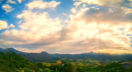 Wall Mural - Golden sky sunrise dramatic beautiful landscape view. Dawn sky gold dusk time cloudscape with sunlight. Dramatic sunset scenic landscape. Beautiful landscape sunshine nature