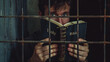 © Thumbs - Man Reading Bible Behind Bars, Prison, Faith, Religion
