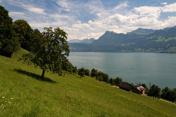 Wall Mural - Alps mountains and like in Switzerland. Alps nature in Switzerland. Swiss Alps. Panoramic of the nature of Switzerland. Nature of Swiss lakes. Switzerland scenic landscape. Alps Nature background.