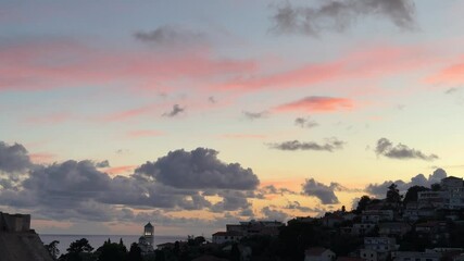 Canvas Print - sunset sky clouds over the city at evening 