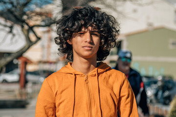 Sticker - young man with doubt or hesitant gesture on the street