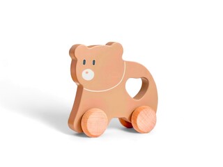 A wooden toy car shaped like a bear character on a white background