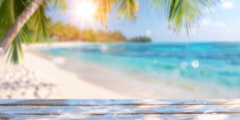 wooden table top with white sand and palm tree leaves on the beach background with blur blue sea