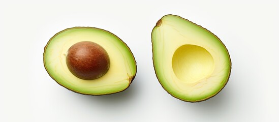 Poster - fresh ripe avocado fruit sliced in half with a white background and space for text or images. with c